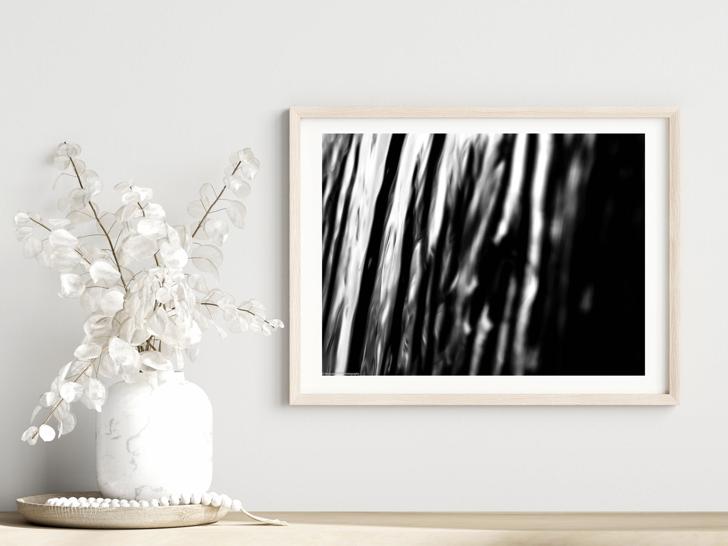 Ripple print showcased in a template for a room setting with minimalist plants, as it would be if purchased displayed