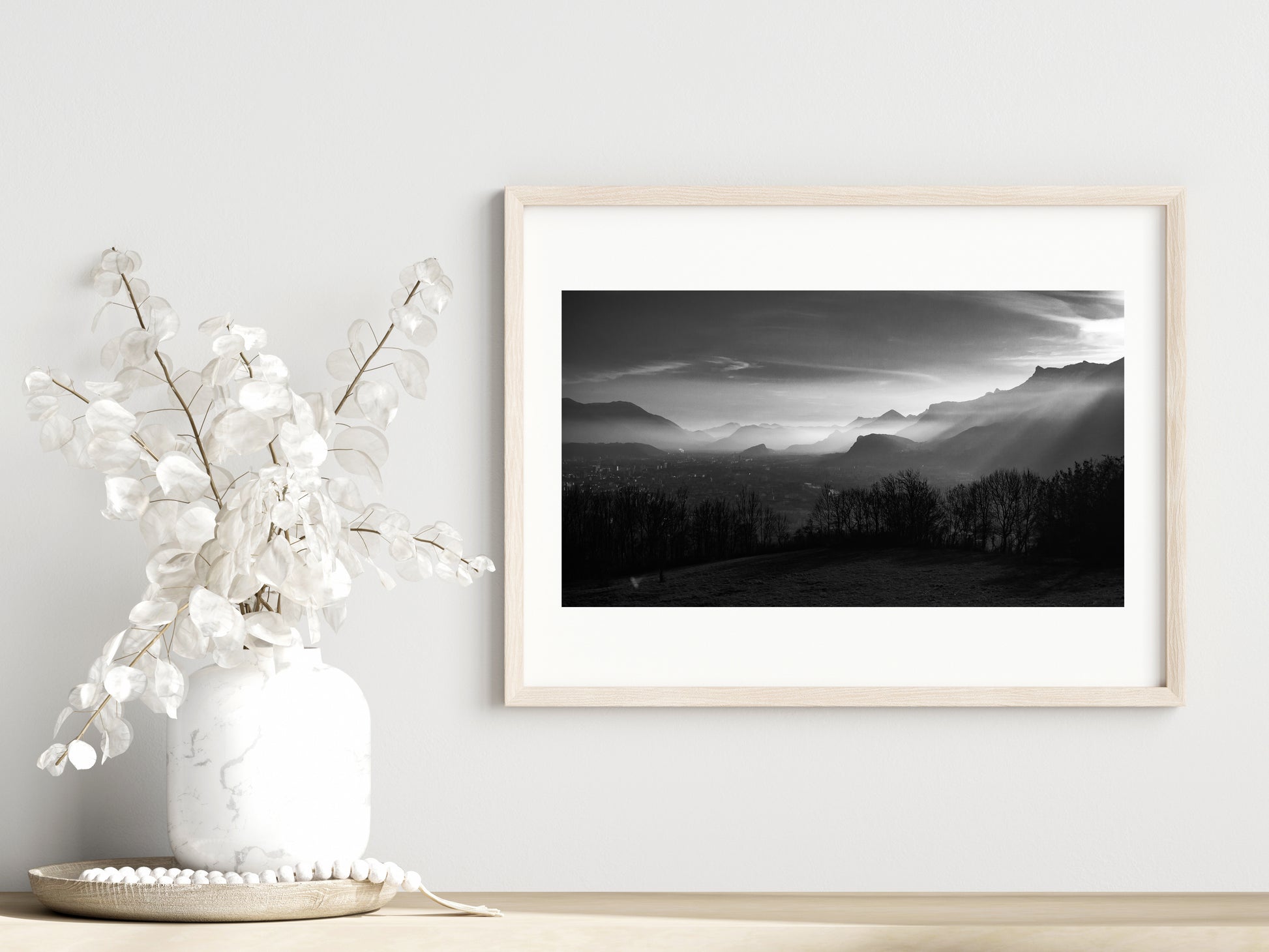 Grenoble into dusk print showcased in a template for a room setting with minimalist plants, as it would be if purchased displayed