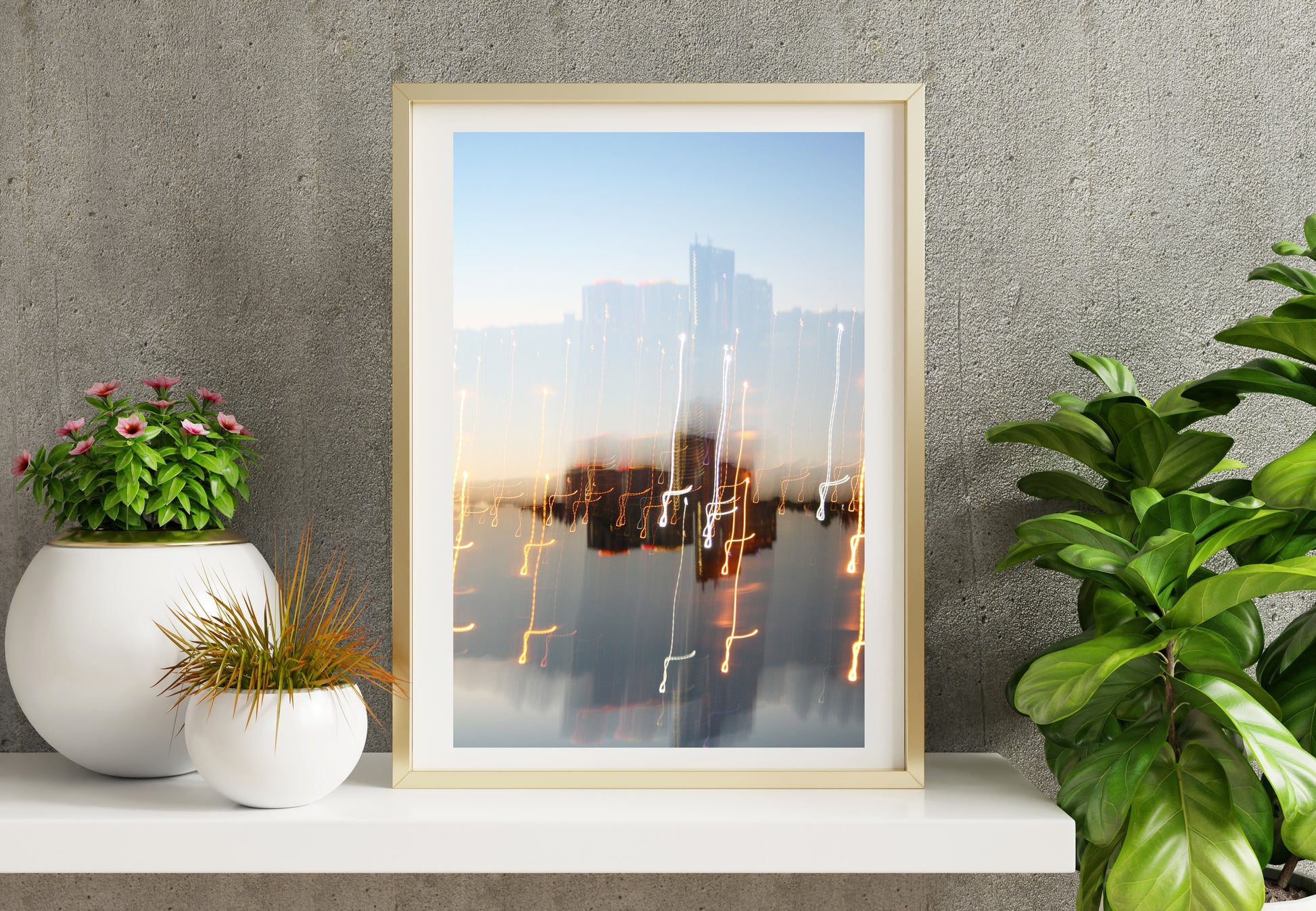 Between lights print showcased in a template for a room setting with minimalist plants, as it would be if purchased displayed